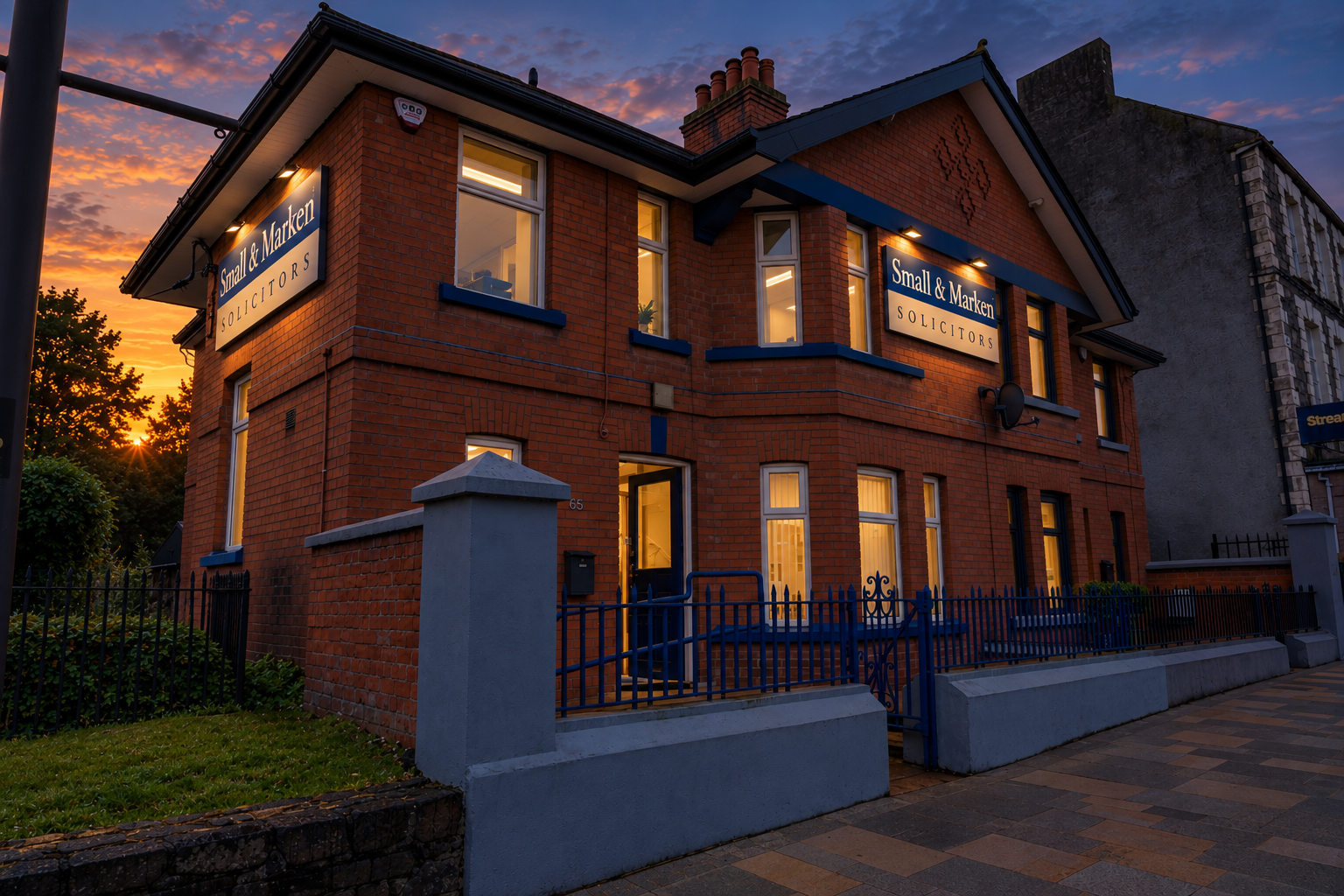 Small & Marken Solicitors' office on Church Street, Antrim, at sunset